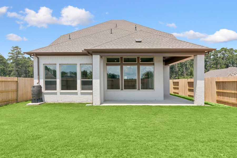 Exterior details and patio area of a home in ARTAVIA 45' Homesites, Conroe (Image 23).