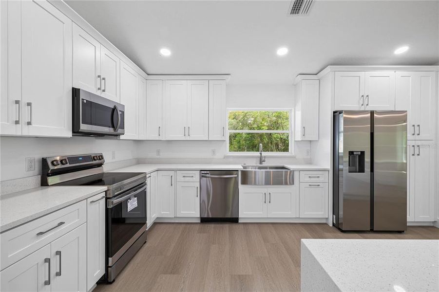 Furnished interior view inside a new home in , Dunnellon (Image 9).