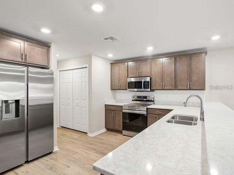 Furnished interior view inside a new home in , St. Cloud (Image 4).