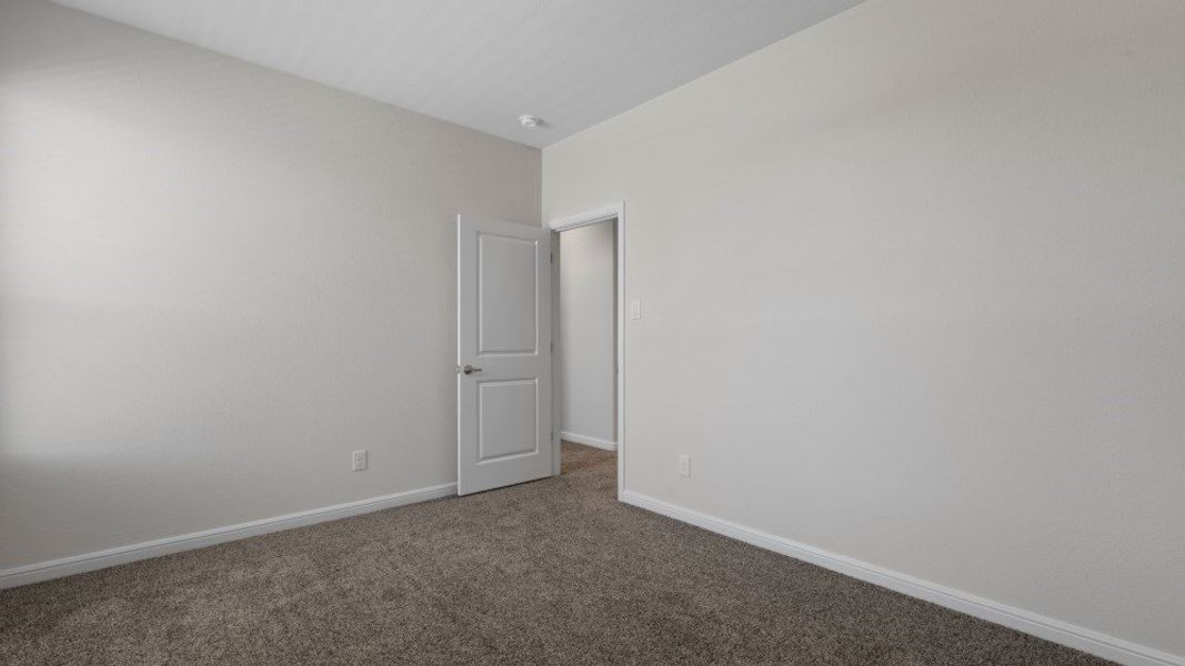 Representative unfurnished interior of a home built from the Valley Spring by D.R. Horton in Eden Ranch, Arlington (Image 40).