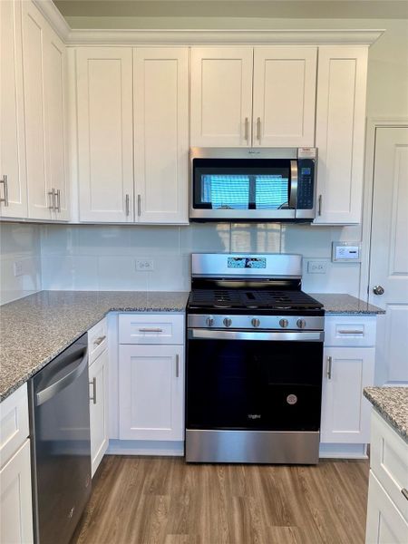Furnished interior view inside a new home in , Cypress (Image 7).