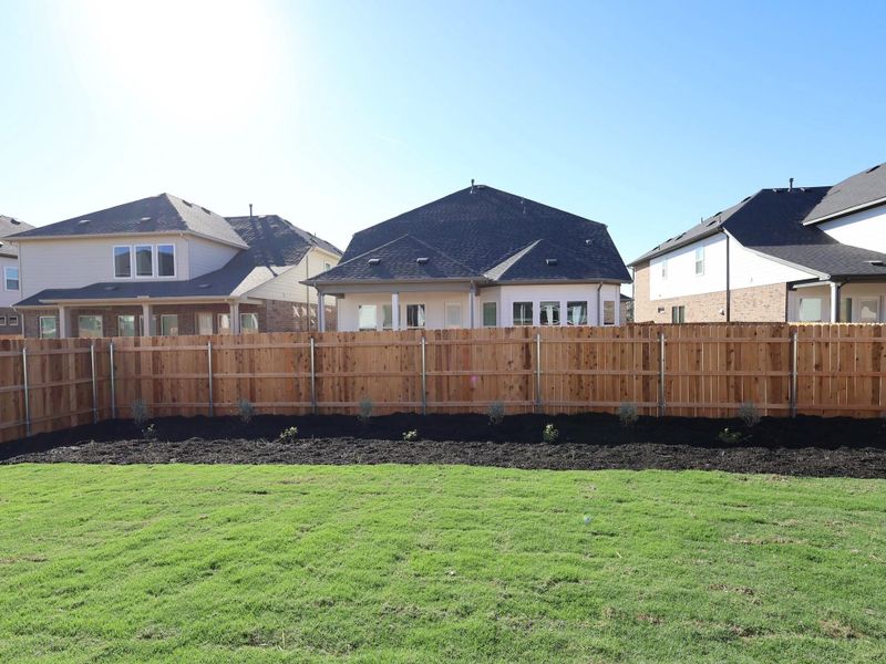 Exterior details and patio area of a home in Barksdale, Leander (Image 4).