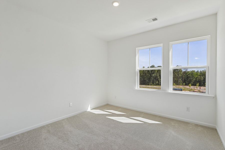 Spacious, unfurnished interior of a new home in Terraces at the Exchange, Fort Mill (Image 28).
