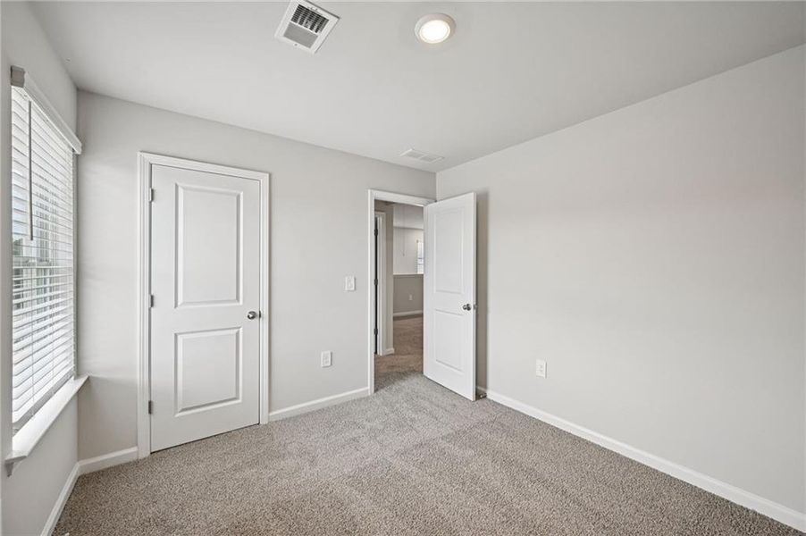 Spacious, unfurnished interior of a new home in Avalon - Reserve Series, Conyers (Image 30). Spacious, unfurnished interior of a new home in Avalon - Reserve Series, Conyers (Image 30).