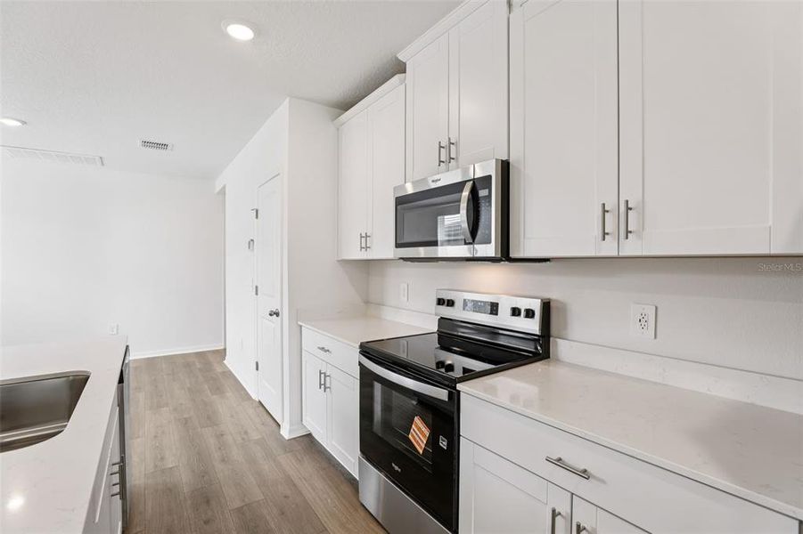 Furnished interior view inside a new home in Hamilton Bluff - Classic Series, Lake Hamilton (Image 11).
