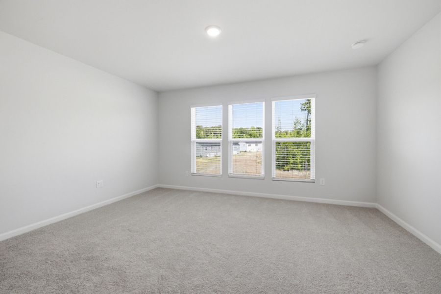 Spacious, unfurnished interior of a new home in Carpenter Falls, Durham (Image 27).