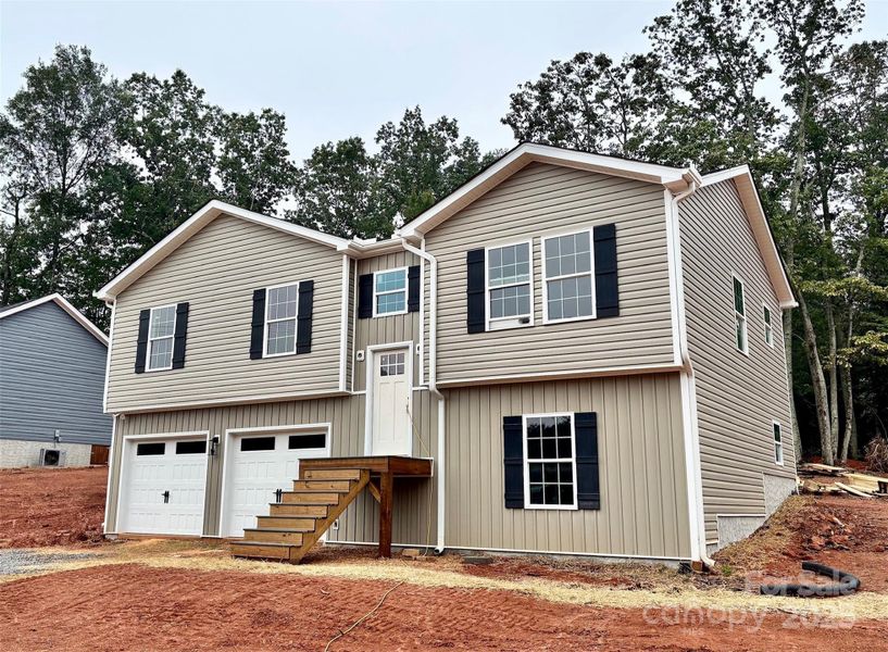 Front exterior of a new home in , Granite Falls, NC, highlighting curb appeal (Image 13). Front exterior of a new home in , Granite Falls, NC, highlighting curb appeal (Image 13).