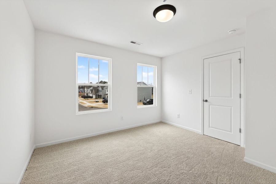 Spacious, unfurnished interior of a new home in Nathans Ridge, Lillington (Image 20).
