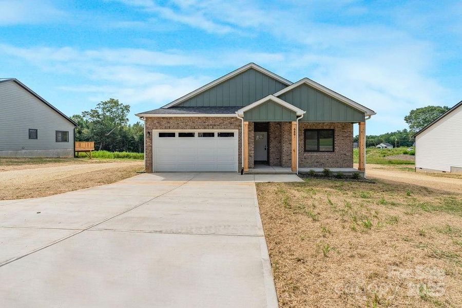 Front exterior of a new home in , Lincolnton, NC, highlighting curb appeal (Image 15).