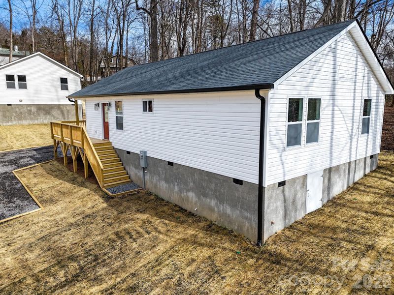 Exterior details and patio area of a home in , Black Mountain (Image 26). Exterior details and patio area of a home in , Black Mountain (Image 26).