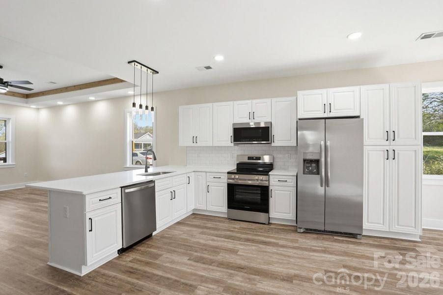 Furnished interior view inside a new home in , Concord (Image 12).