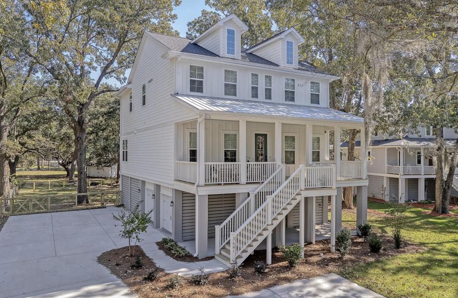 Front exterior of a new home in , Johns Island, SC, highlighting curb appeal (Image 14).