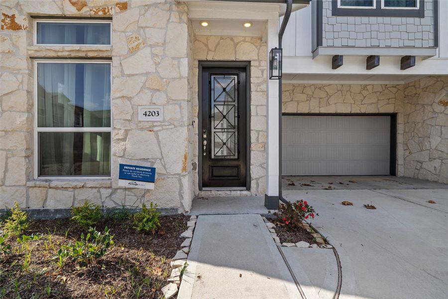 Exterior details and patio area of a home in , Houston (Image 4).