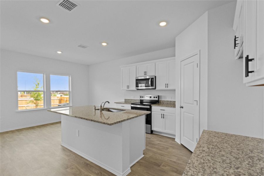 Furnished interior view inside a new home in Palomino, Manor (Image 7).