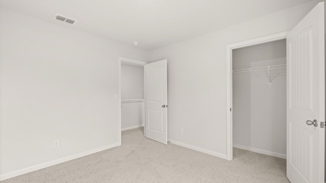 Representative unfurnished interior of a home built from the Flora by D.R. Horton in Sheffield Highlands, Dallas (Image 25).