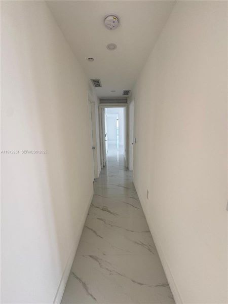 Spacious, unfurnished interior of a new home in Aria Reserve, Miami (Image 24).