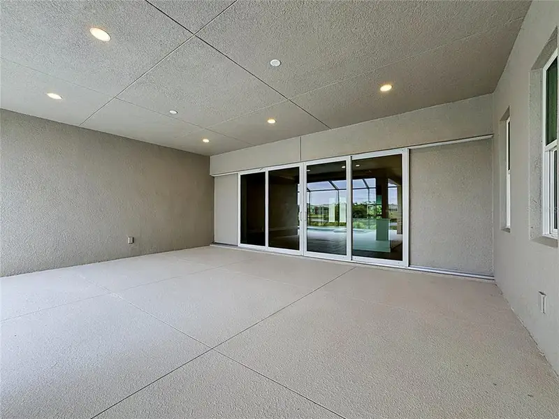 Exterior details and patio area of a home in River Preserve Estates, Parrish (Image 3).