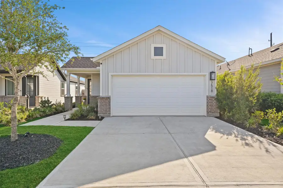 Front exterior of a new home in Mason Woods 40s, Cypress, TX, highlighting curb appeal (Image 2). Front exterior of a new home in Mason Woods 40s, Cypress, TX, highlighting curb appeal (Image 2).