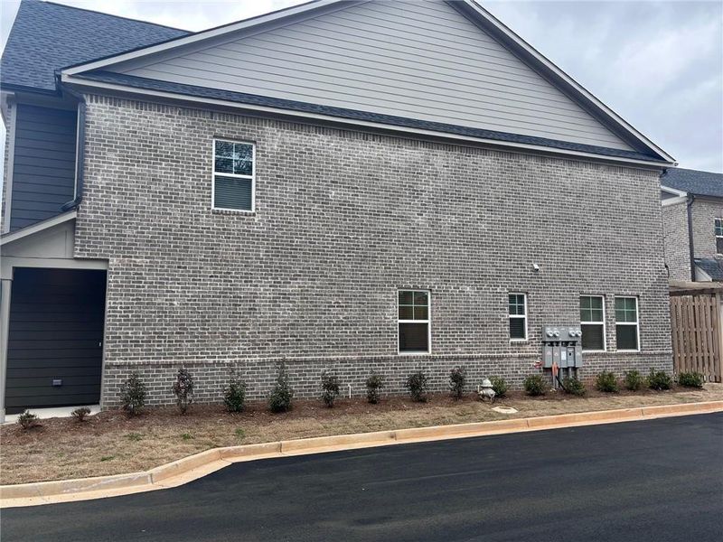 Exterior details and patio area of a home in Governors Parc, Kennesaw (Image 3).