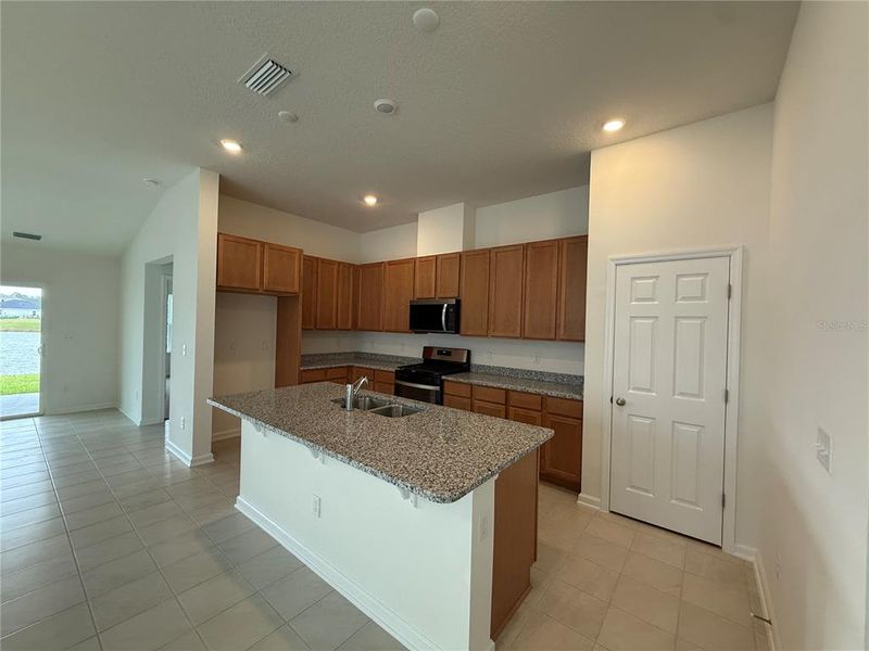 Furnished interior view inside a new home in Whiteview Village, Palm Coast (Image 7).