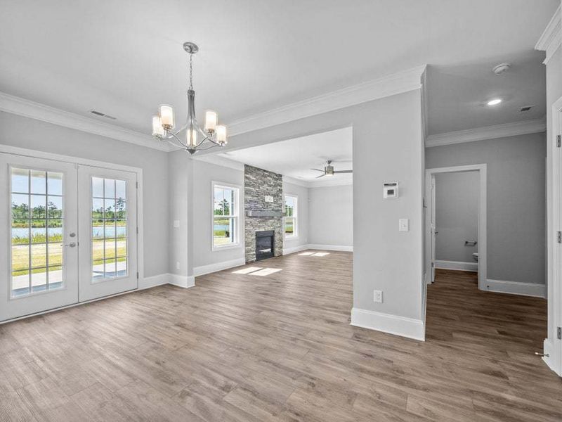 Great Room with Fireplace with Stone Surround Option Great Room with Fireplace with Stone Surround Option