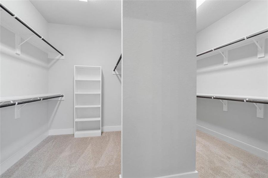 Look at this immaculate closet! With high shelving, multiple rows to hang clothing, you are sure to have enough room for all your belongings!