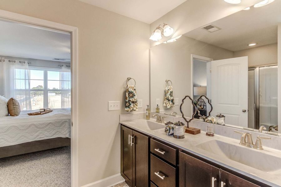 Representative furnished interior of a home built from the Drayton by Caviness & Cates Communities in Bartlett Manor, Youngsville (Image 216).
