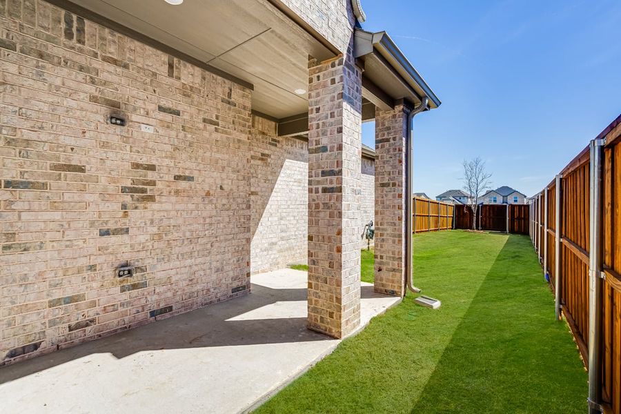 Representative exterior photo of a completed home built from the Carmichael by Taylor Morrison in Cross Creek Meadows 40s, Celina, TX (Image 17). Representative exterior photo of a completed home built from the Carmichael by Taylor Morrison in Cross Creek Meadows 40s, Celina, TX (Image 17).
