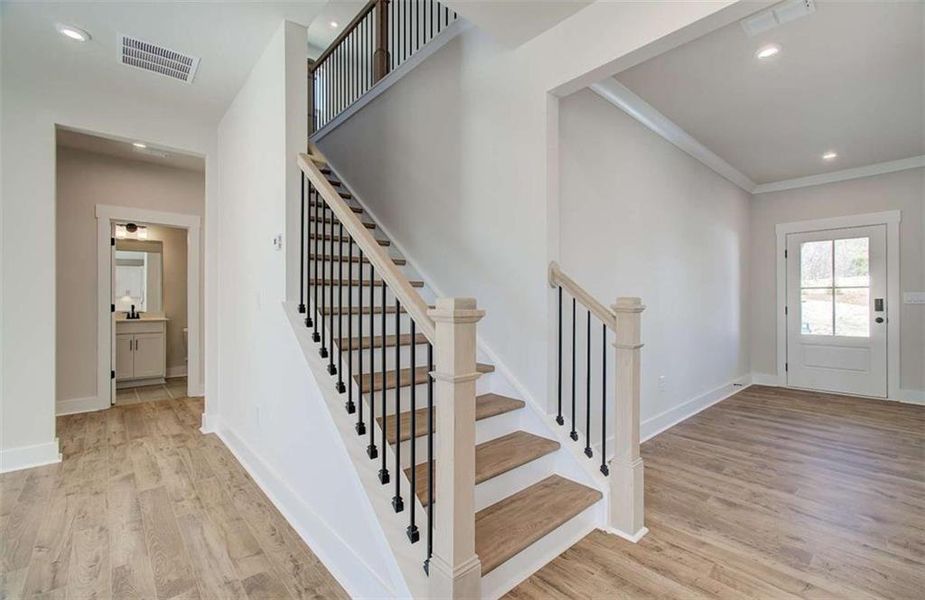 Spacious, unfurnished interior of a new home in The Paddocks at Doc Hughes, Buford (Image 19).