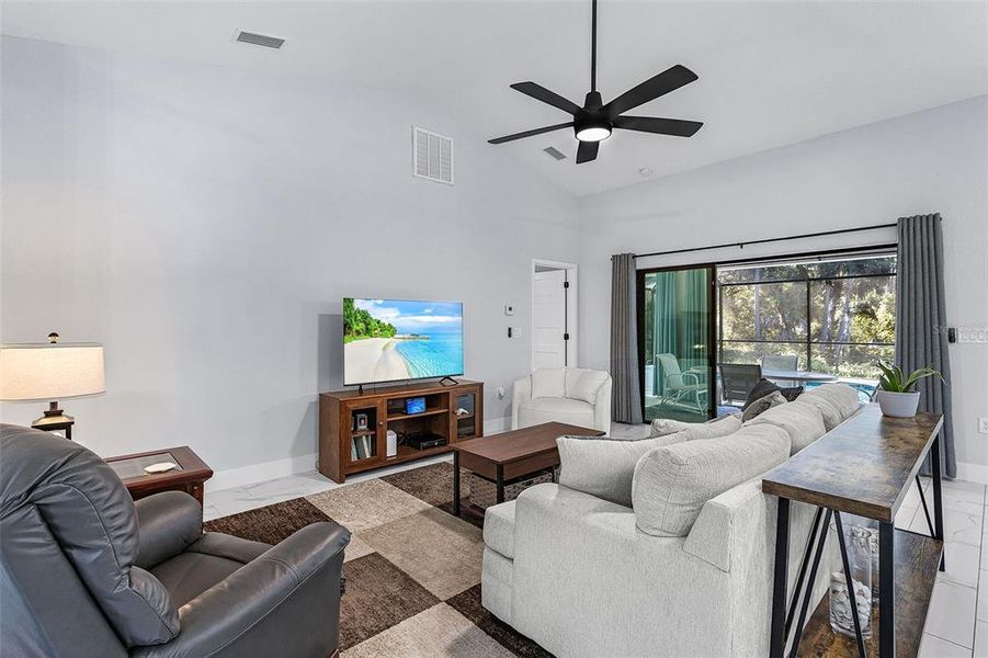Furnished interior view inside a new home in , Port Charlotte (Image 13).