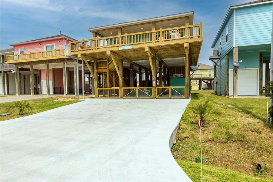 Front exterior of a new home in , Crystal Beach, TX, highlighting curb appeal (Image 19).
