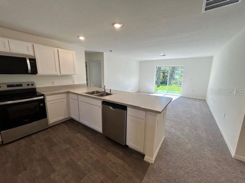 Furnished interior view inside a new home in Port Charlotte, Port Charlotte (Image 4).
