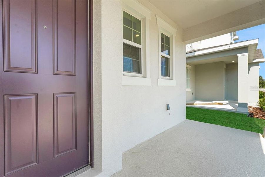 Exterior details and patio area of a home in Crossroads at Kelly Park, Apopka (Image 23). Exterior details and patio area of a home in Crossroads at Kelly Park, Apopka (Image 23).