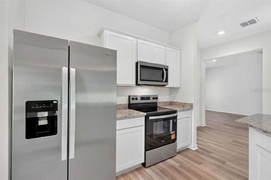 Furnished interior view inside a new home in , Deltona (Image 7).