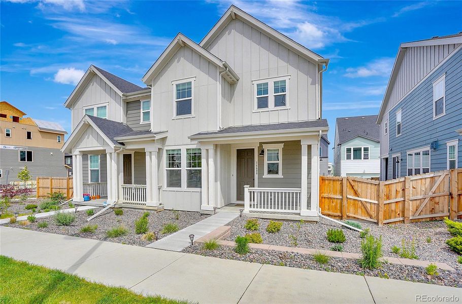 Front exterior of a new home in , Broomfield, CO, highlighting curb appeal (Image 26).