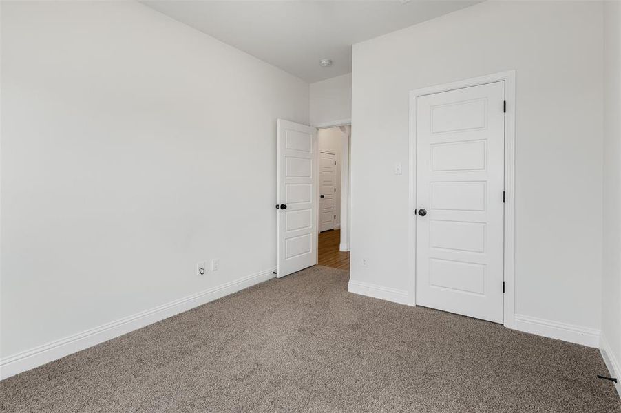 Secondary Bedroom right of entryway