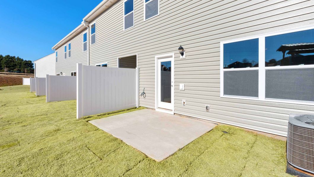 Exterior details and patio area of a home in Covington Village, Greer (Image 3).