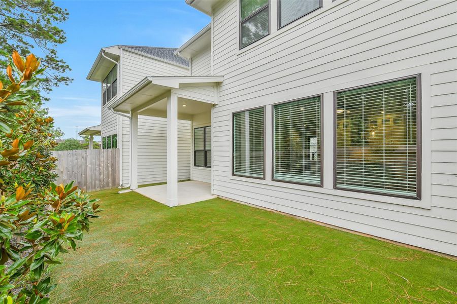 Exterior details and patio area of a home in Summer Place  35', Montgomery (Image 30).