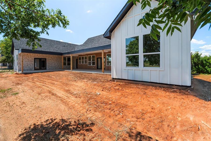 Front exterior of a new home in , Joshua, TX, highlighting curb appeal (Image 25).