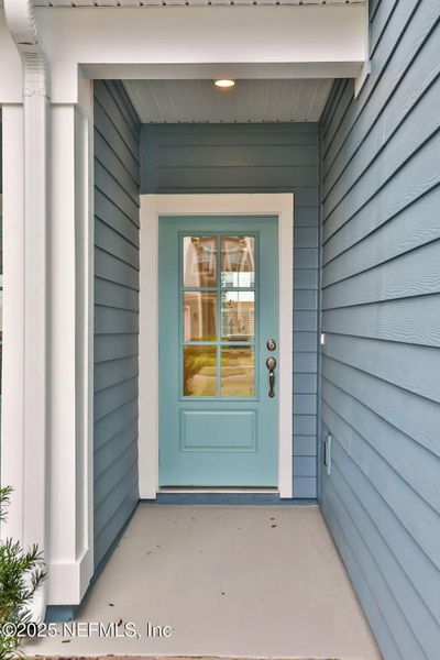 Exterior details and patio area of a home in Silver Landing at SilverLeaf, St. Augustine (Image 21).