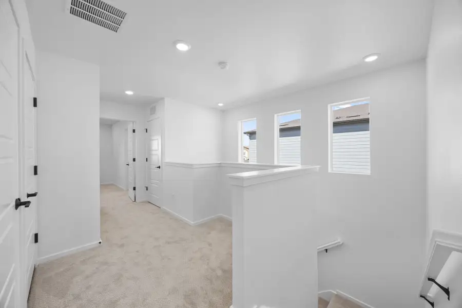 Spacious, unfurnished interior of a new home in Sky Ranch, Watkins (Image 22).