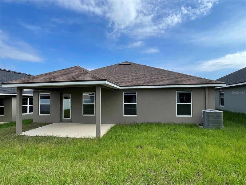 Front exterior of a new home in Abbey Glen, Dade City, FL, highlighting curb appeal (Image 1). Front exterior of a new home in Abbey Glen, Dade City, FL, highlighting curb appeal (Image 1).