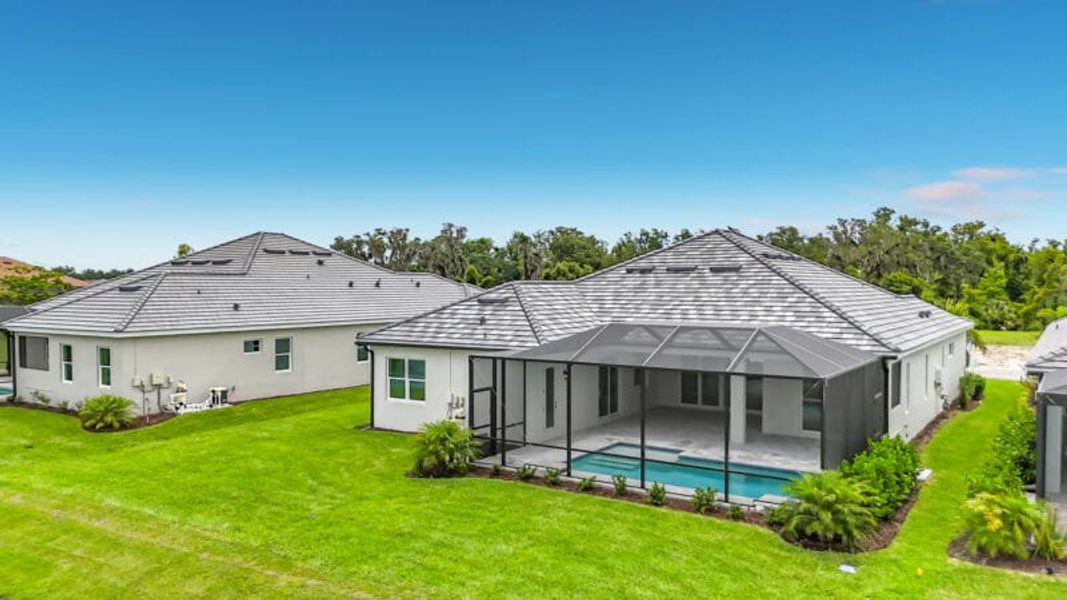 Exterior details and patio area of a home in River Preserve Estates, Parrish (Image 33).