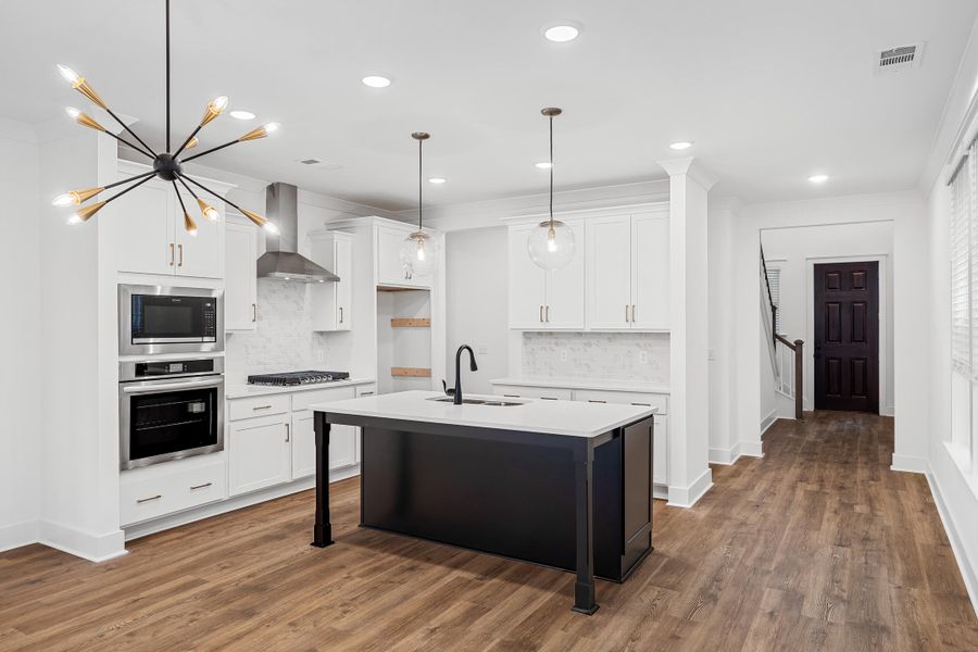 Furnished interior view inside a new home in Sweetgrass Station, Summerville (Image 6).