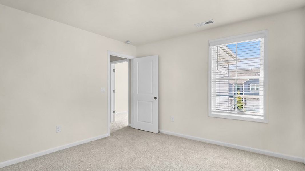 Spacious, unfurnished interior of a new home in Lybrook Village, Advance (Image 26).