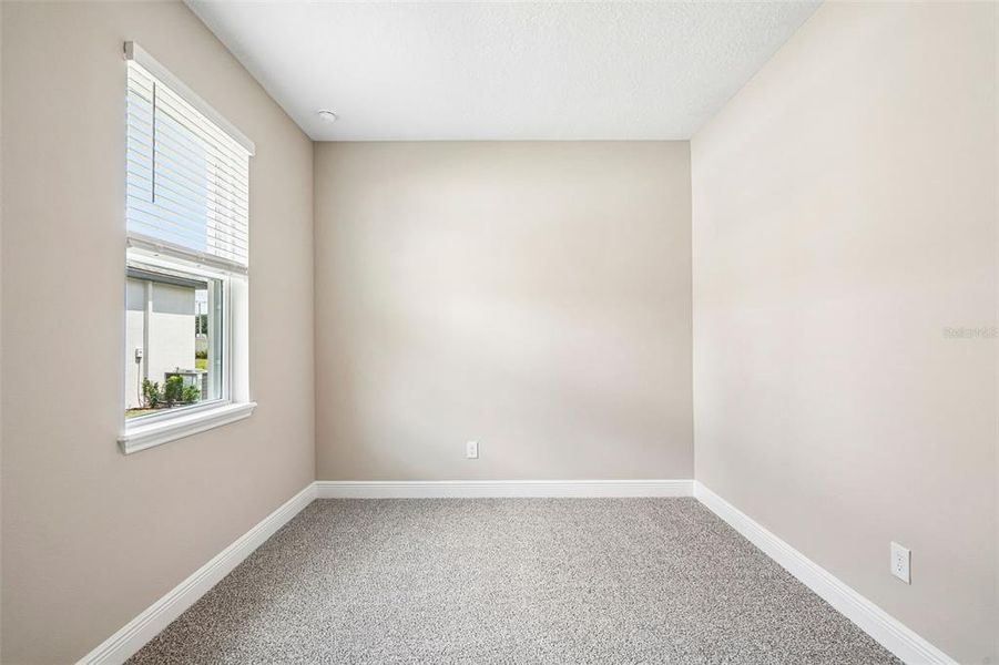 Spacious, unfurnished interior of a new home in Legends Preserve - Signature Series, Daytona Beach (Image 21).