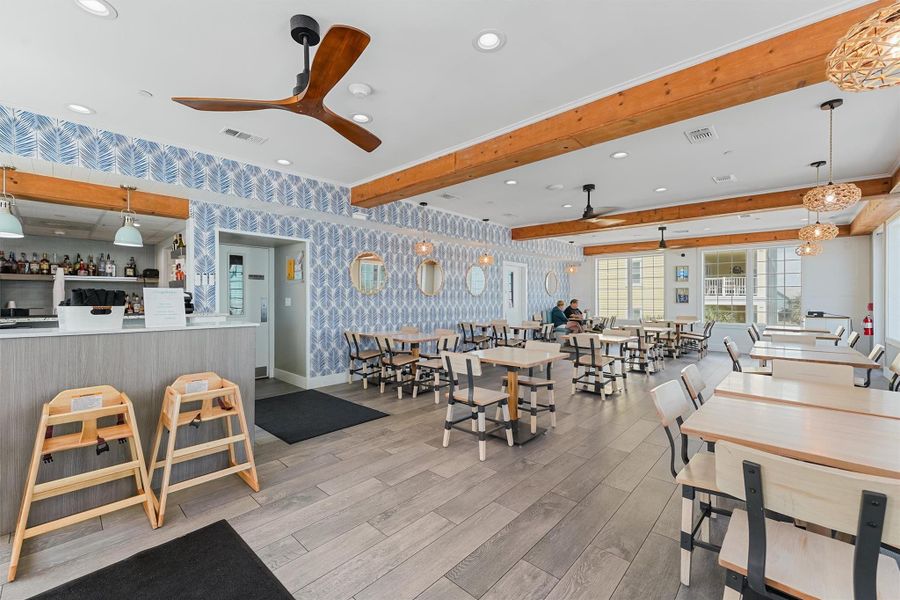 The Clubhouse Restaurant also features stylish interiors and a full menu, making it the perfect spot for meals with family and friends.