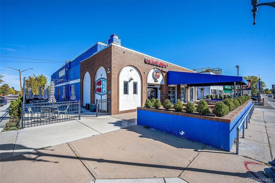 Front exterior of a new home in , Wheat Ridge, CO, highlighting curb appeal (Image 21). Front exterior of a new home in , Wheat Ridge, CO, highlighting curb appeal (Image 21).