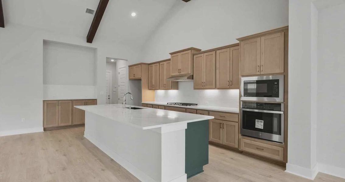 Representative furnished interior of a home built from the Draco by Chesmar Homes in Gregg Ranch, Marble Falls (Image 5).