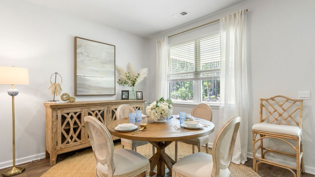 Furnished interior view inside a new home in Pine Hills at Cane Bay, Summerville (Image 5). Furnished interior view inside a new home in Pine Hills at Cane Bay, Summerville (Image 5).